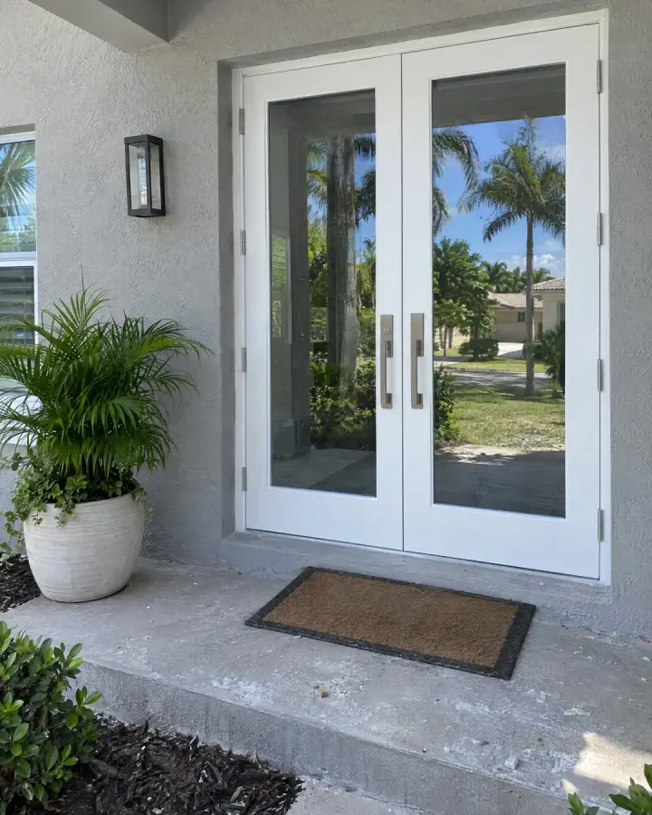 White double front doors with glass panels